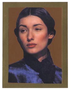 PICTURE OF LADY  WITH WARM SKINTONES AND  WARM BACKGROUND WHICH LOOKS OUT OF BALANCE